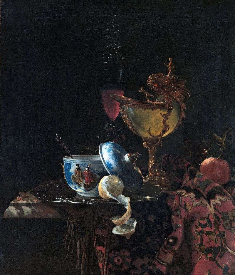 Still life with a cup of pearl shell by Willem Calf