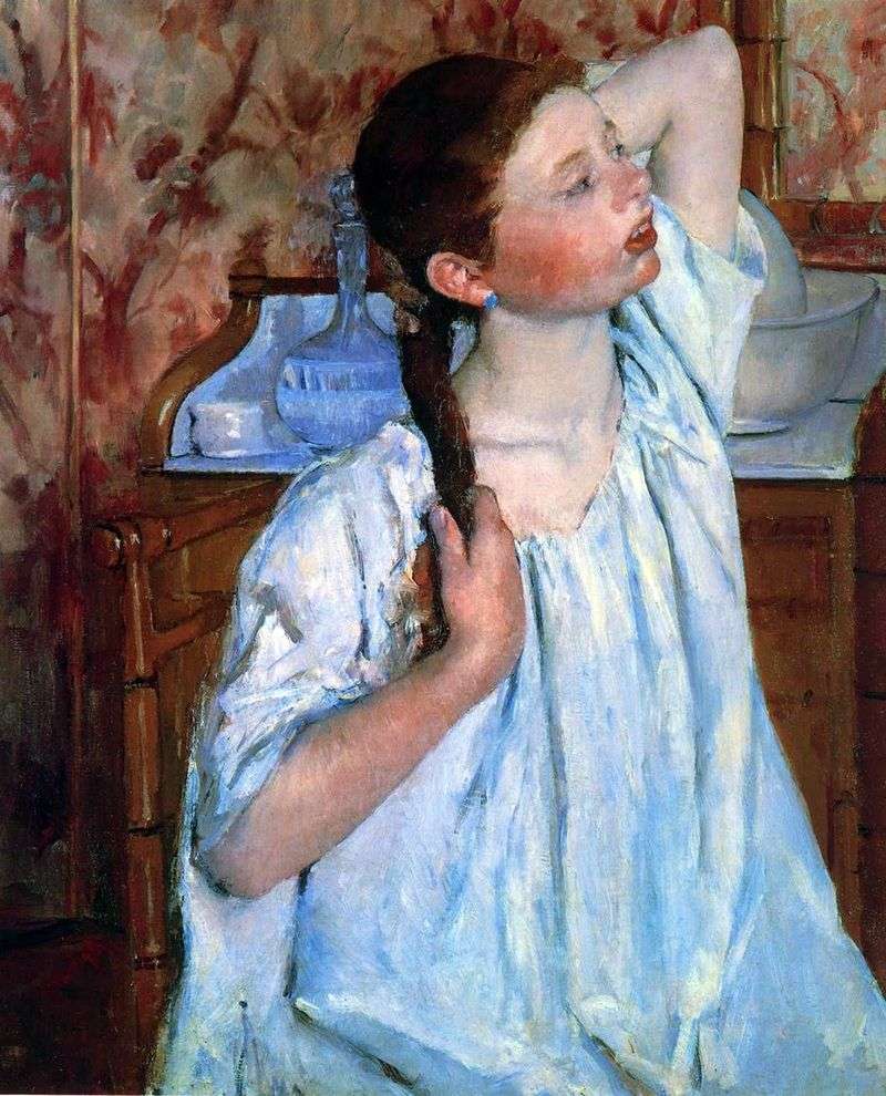 The girl is combing her hair by Mary Cassatt